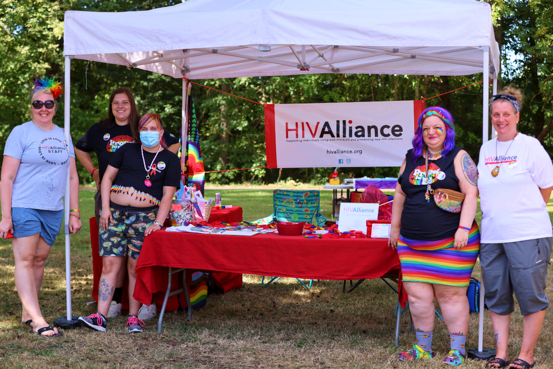 photo of a awareness booth from website redesign for HIV Alliance